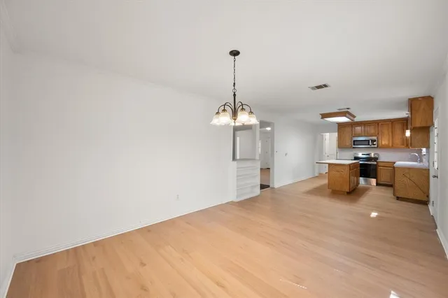 a view of a kitchen with a sink and dishwasher