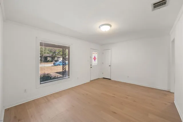 an empty room with window