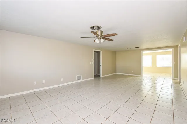 a view of an empty room and window