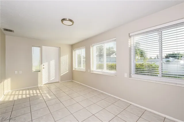a view of an empty room with window