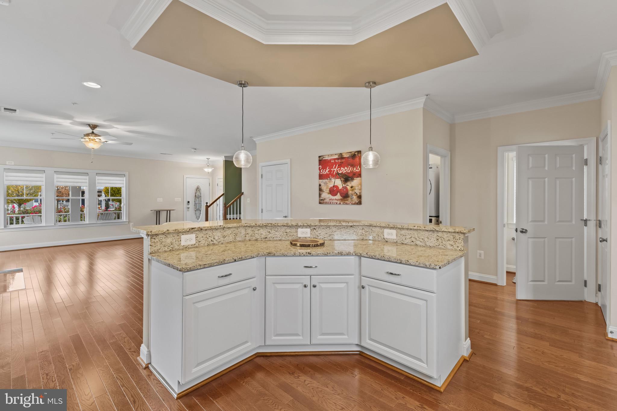 132 Claiborne Street Chester, MD 21619 - Photo 11 of 40 a kitchen with a sink cabinets and wooden floor
