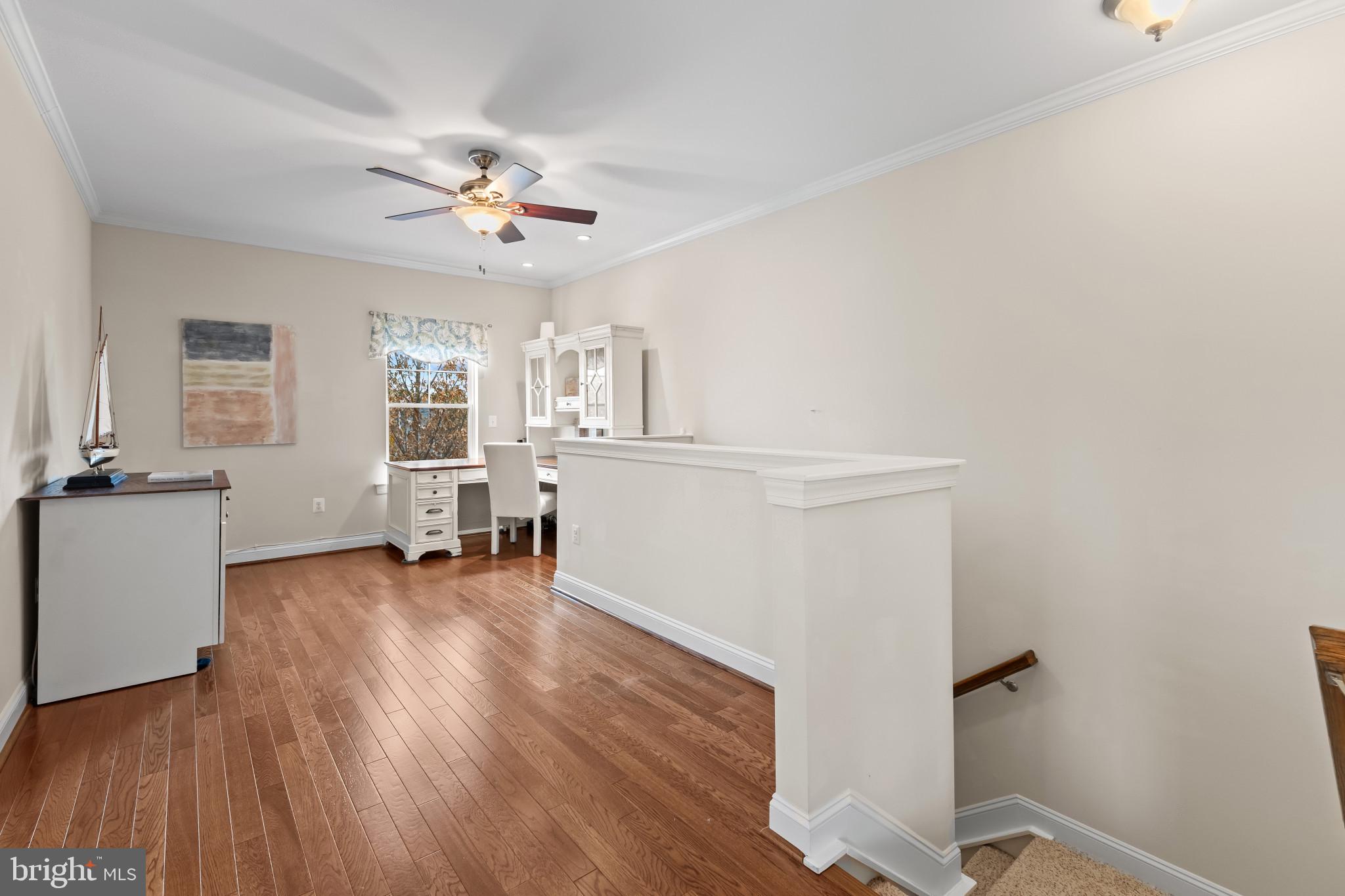132 Claiborne Street Chester, MD 21619 - Photo 16 of 40 wooden floor in an empty room with a window