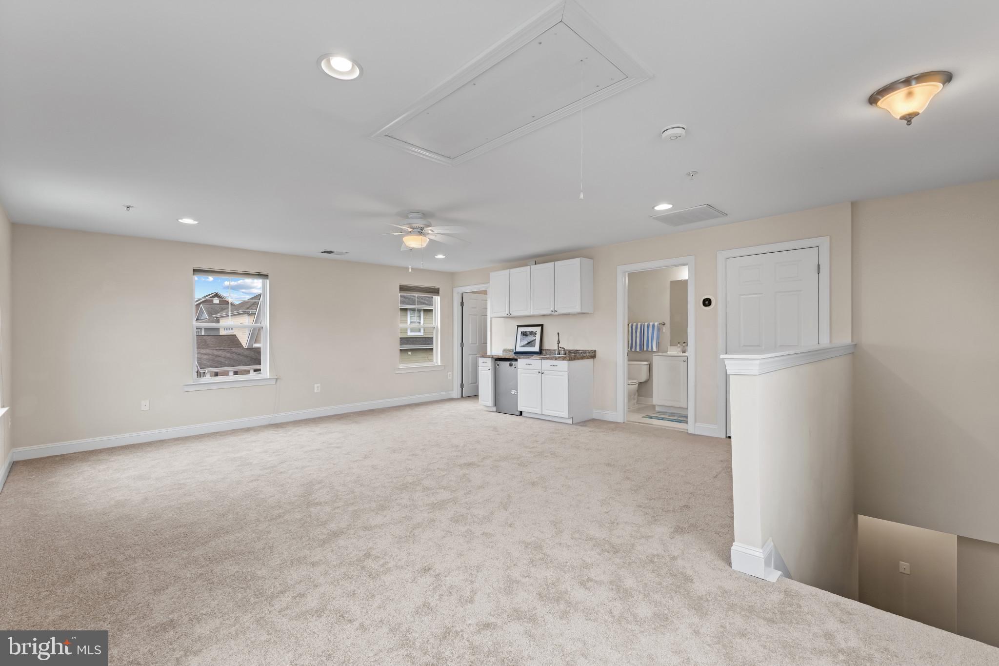 132 Claiborne Street Chester, MD 21619 - Photo 26 of 40 a view of kitchen with refrigerator and window
