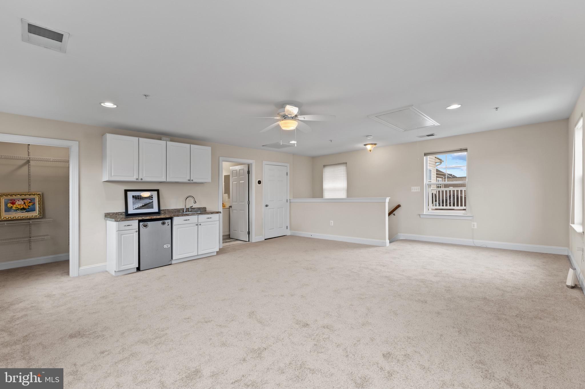 132 Claiborne Street Chester, MD 21619 - Photo 27 of 40 a view of kitchen with cabinets and refrigerator
