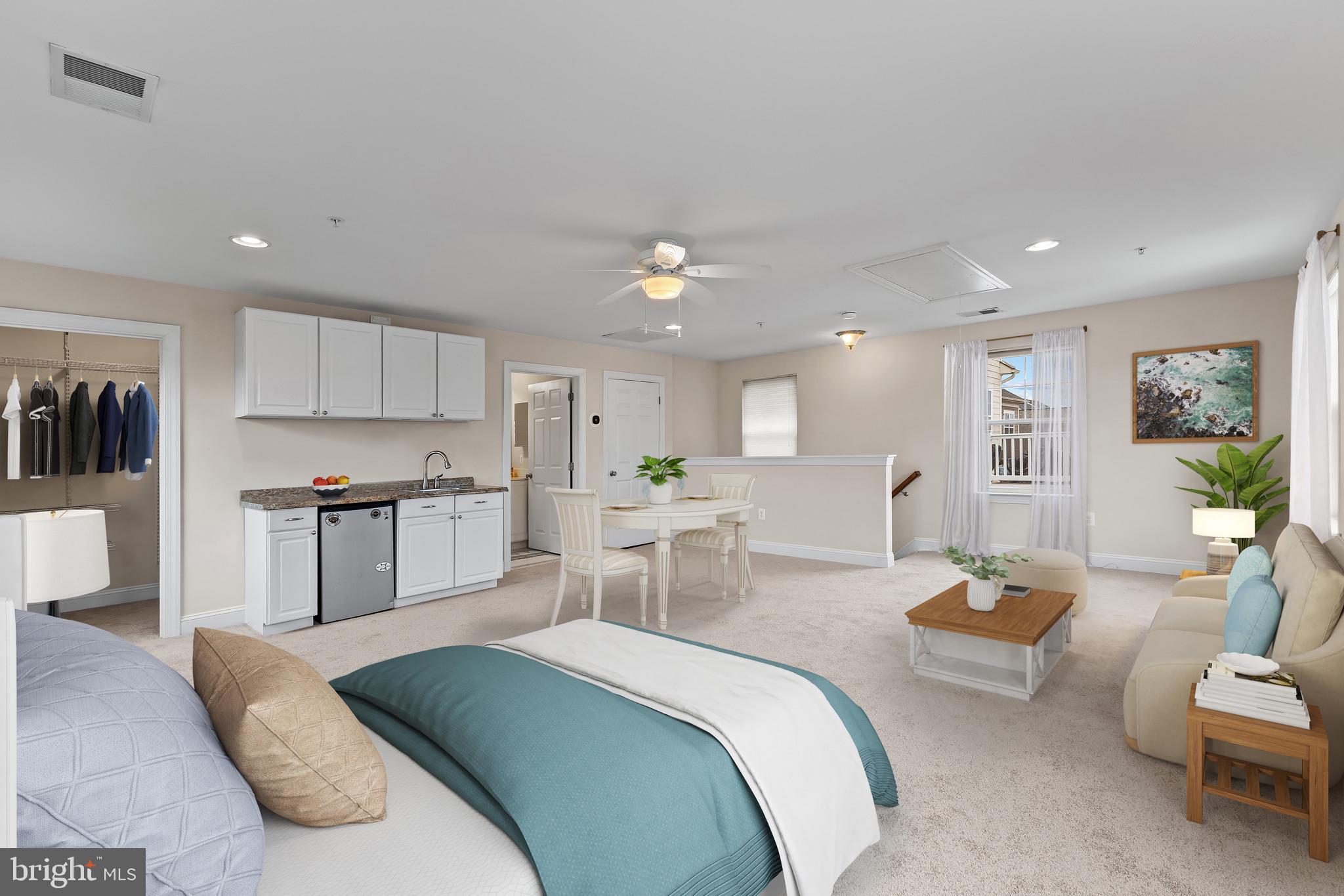 132 Claiborne Street Chester, MD 21619 - Photo 3 of 40 a living room with furniture white walls and kitchen view