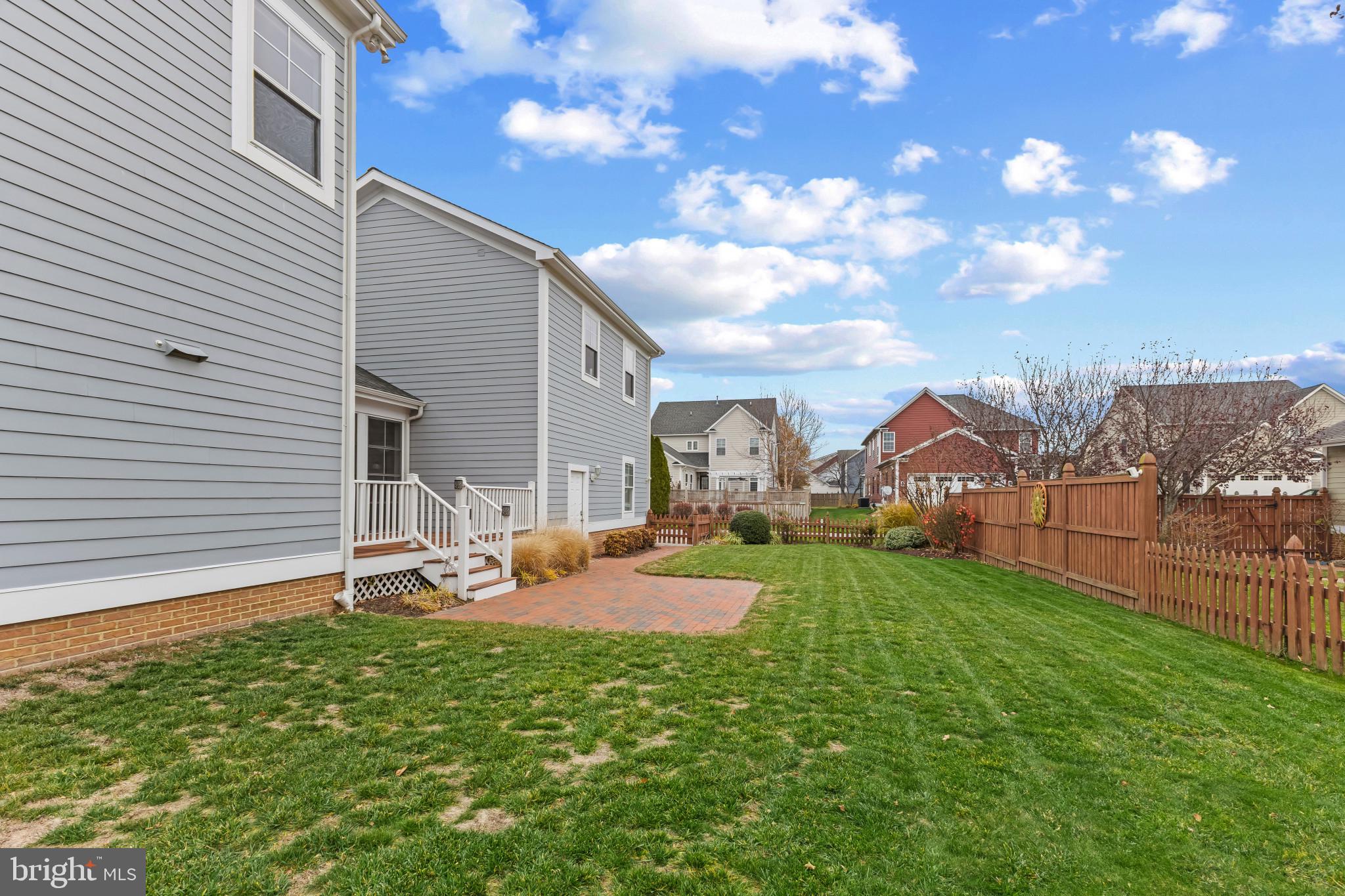 132 Claiborne Street Chester, MD 21619 - Photo 33 of 40 a backyard of a house with table and chairs