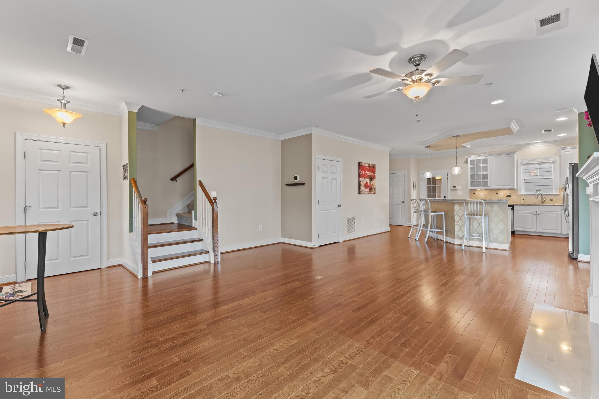 132 Claiborne Street Chester, MD 21619 - Photo 6 of 40 a view of an empty room and wooden floor