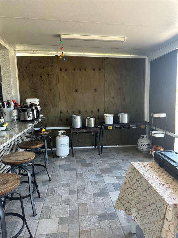 3401 Sand Road Cape Coral, FL 33993 - Photo 21 of 27 a living room with furniture and a rug