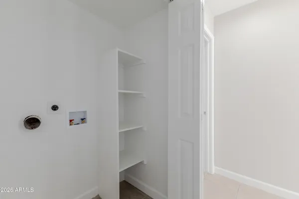 a view of a pathway along the building