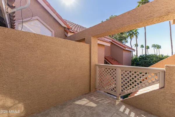 a aerial view of a house with swimming pool and sitting area