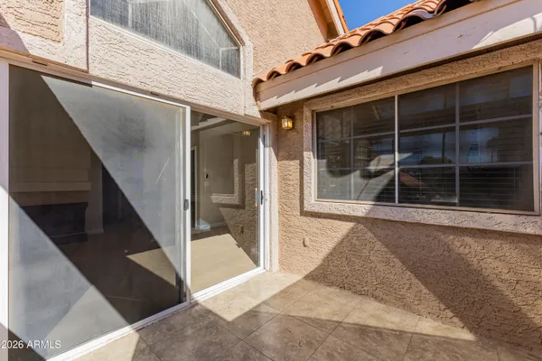 a view of a swimming pool with sitting area