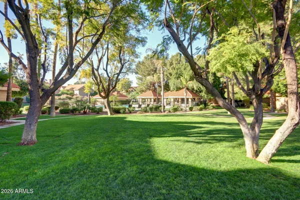 a view of a golf course with a garden