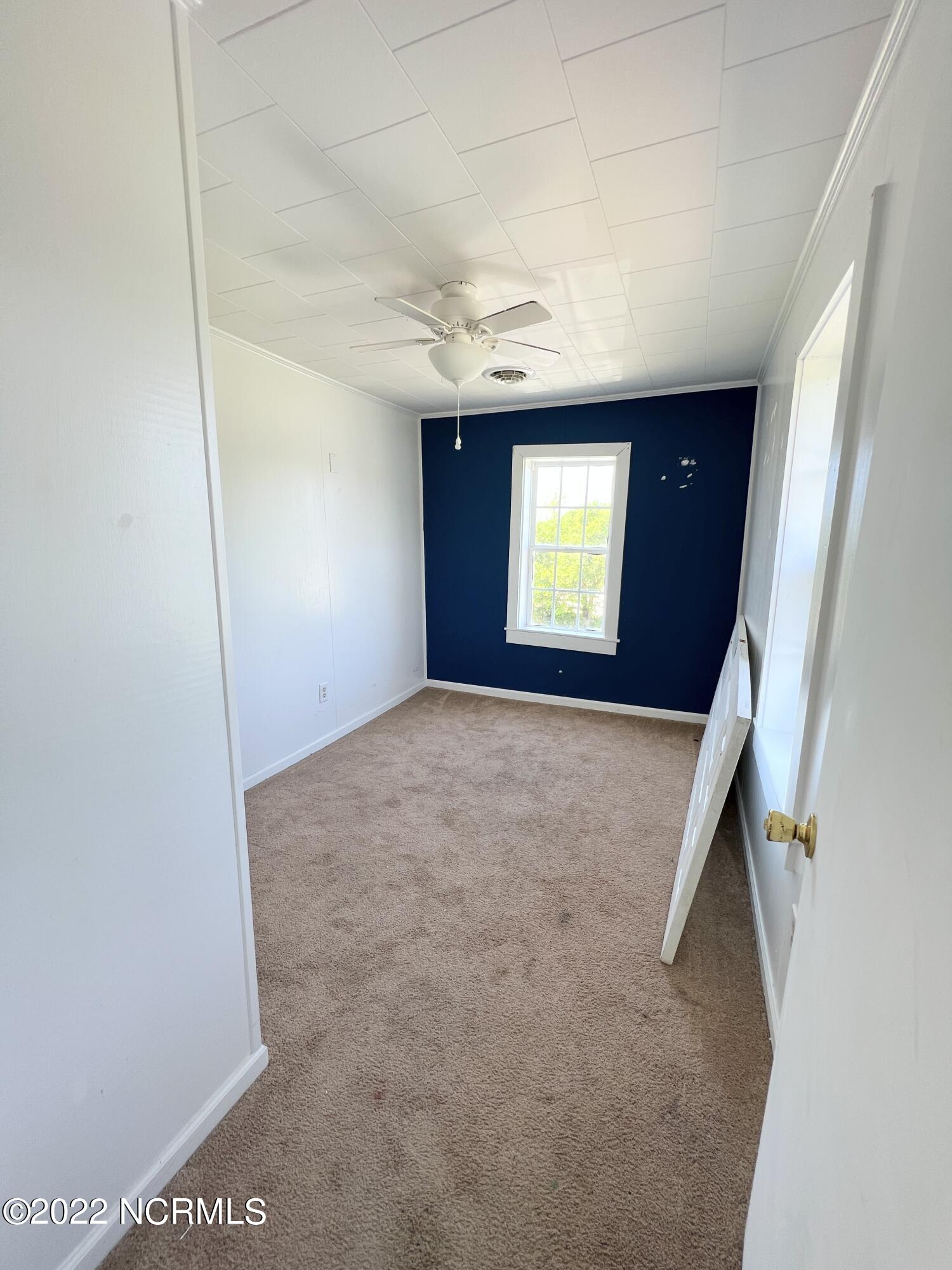 297 Community Road Davis, NC 28524 - Photo 16 of 38 Upstairs Bedroom #2
