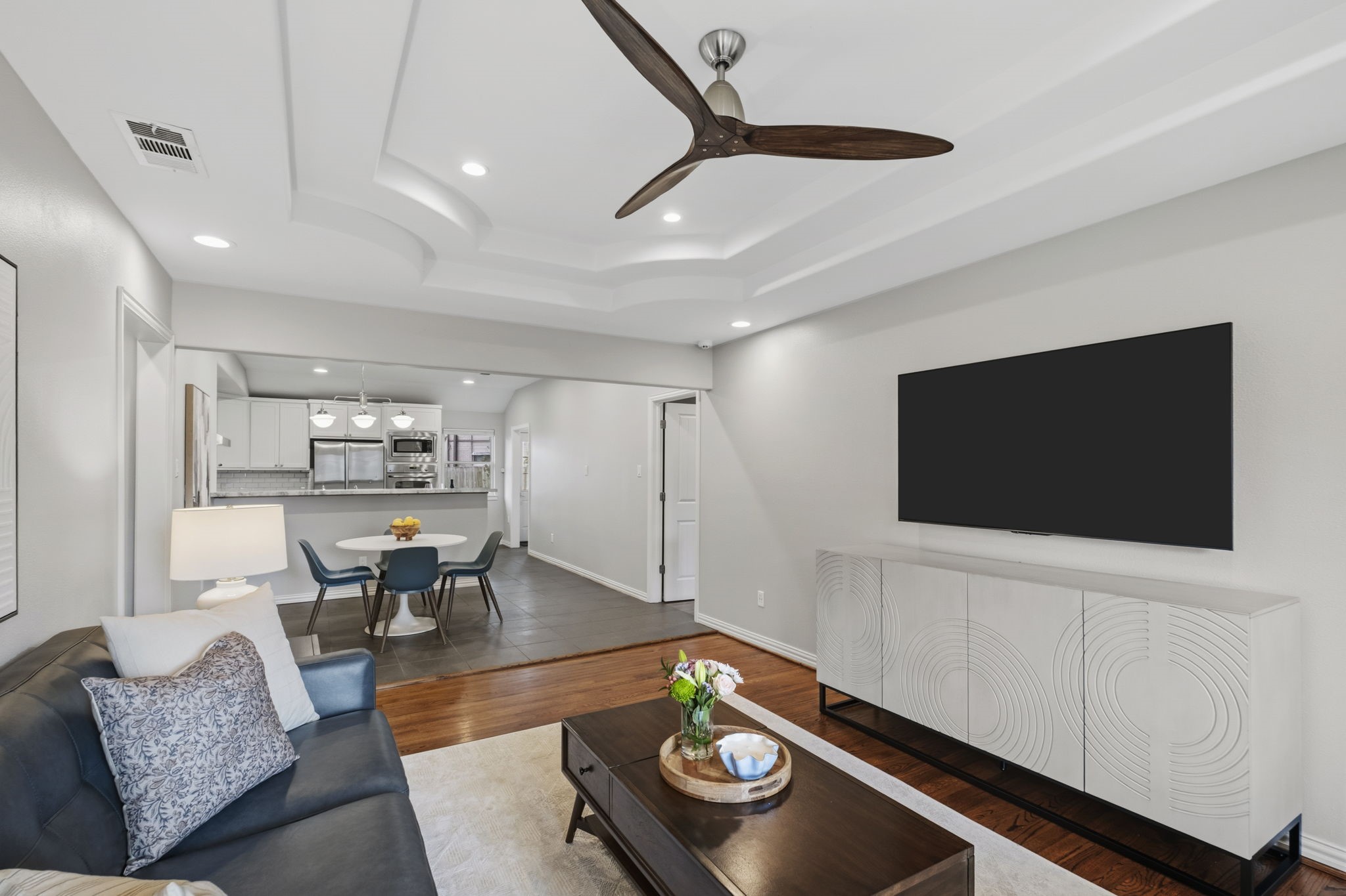 4733 Carleen Road Houston, TX 77092 - Photo 6 of 22 The open-concept layout connects the living room, dining area, and kitchen for easy everyday living and entertaining.