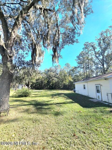 6107 Carlton Road Jacksonville, FL 32244 - Photo 15 of 39 a view of a house with a big yard