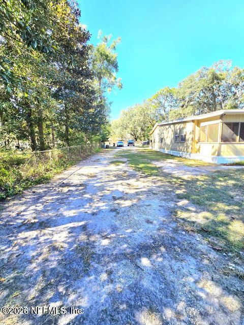 6107 Carlton Road Jacksonville, FL 32244 - Photo 17 of 39 a view of a yard with an outdoor space