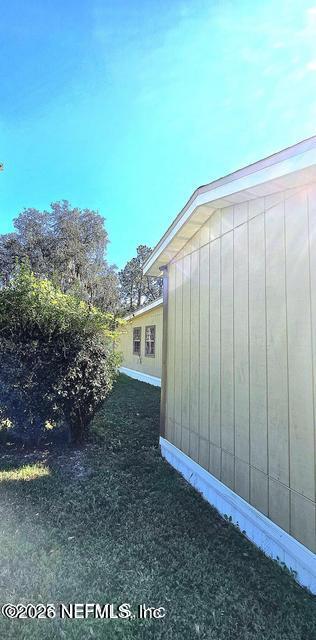 6107 Carlton Road Jacksonville, FL 32244 - Photo 3 of 39 a view of a backyard with plants