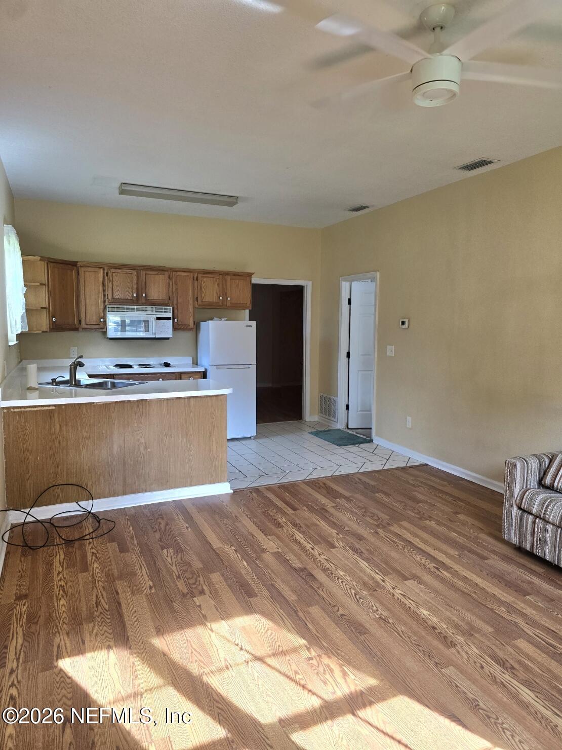 6107 Carlton Road Jacksonville, FL 32244 - Photo 34 of 39 a view of kitchen with wooden floor