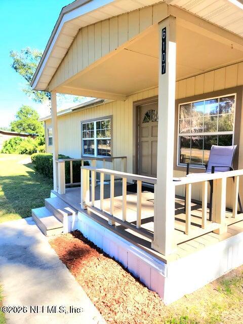 6107 Carlton Road Jacksonville, FL 32244 - Photo 6 of 39 a view of a house with backyard and sitting area