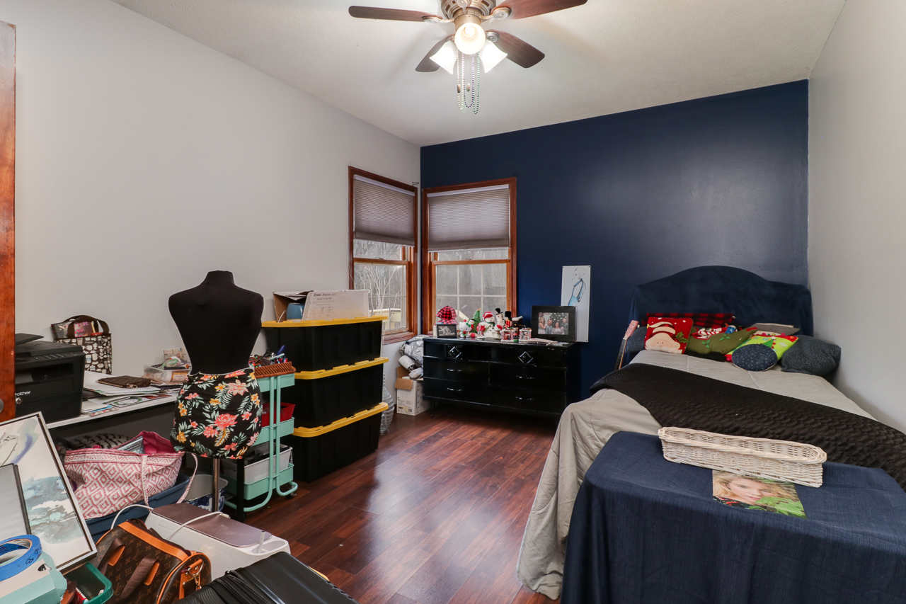 938 Kickapoo Drive Danvers, IL 61732 - Photo 19 of 49 a bedroom with furniture and a window