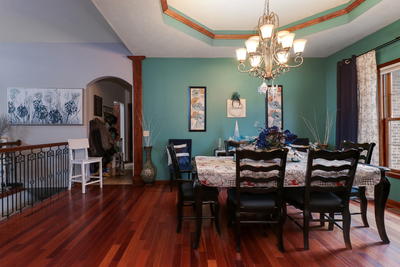 938 Kickapoo Drive Danvers, IL 61732 - Photo 3 of 49 a view of a dining room with furniture and chandelier