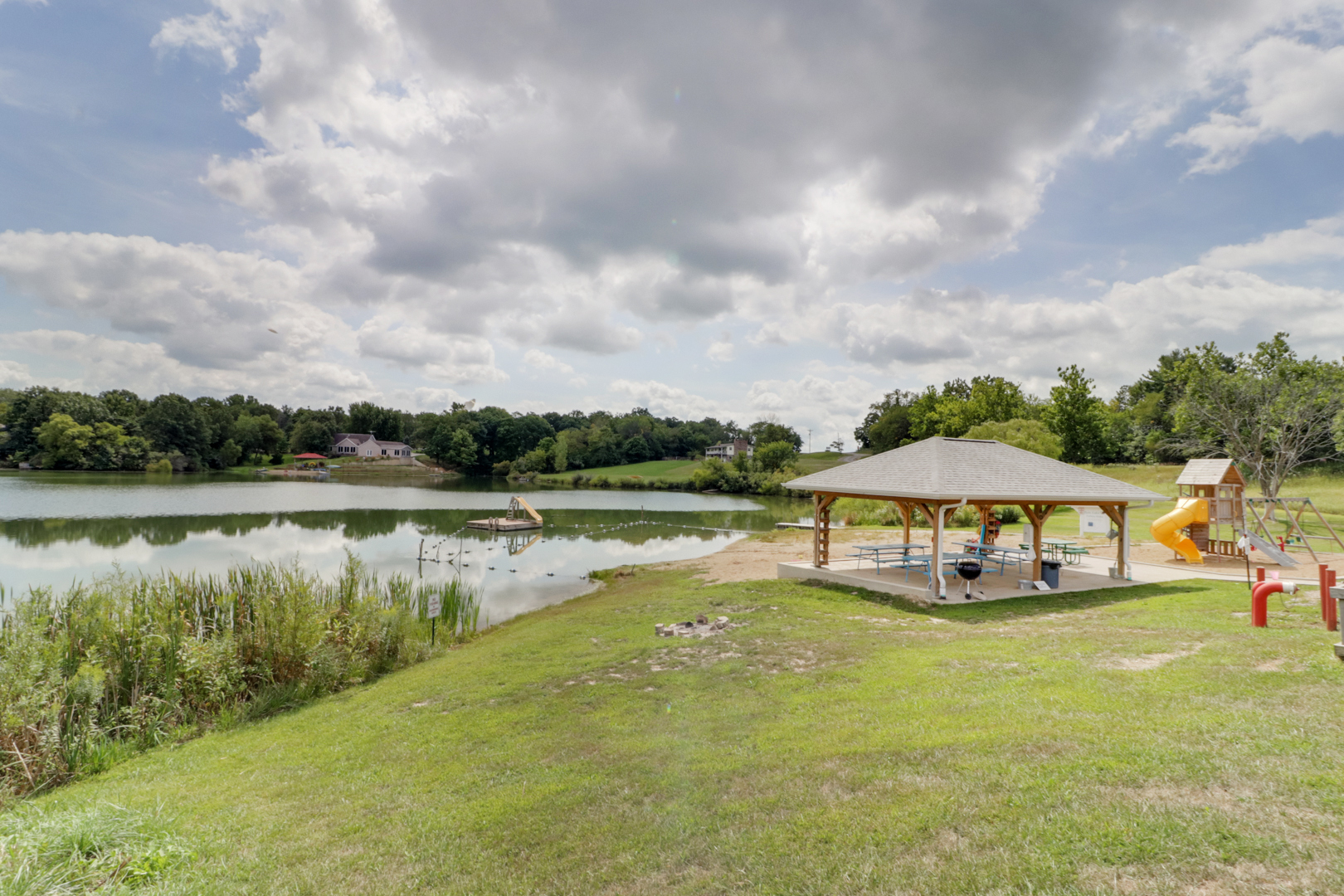 938 Kickapoo Drive Danvers, IL 61732 - Photo 44 of 49 a view of a lake with houses in the back