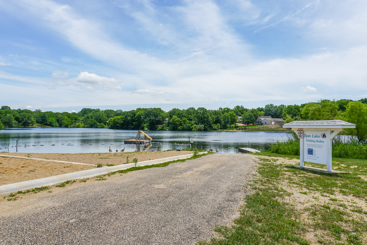 938 Kickapoo Drive Danvers, IL 61732 - Photo 47 of 49 a view of a lake with houses in the back