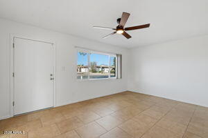 15601 North 22nd Street Phoenix, AZ 85022 - Photo 14 of 27 a view of a livingroom with a ceiling fan and window