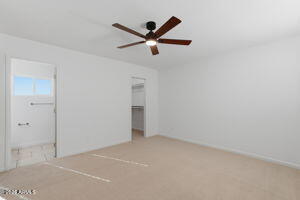 15601 North 22nd Street Phoenix, AZ 85022 - Photo 16 of 27 an empty room with ceiling fan