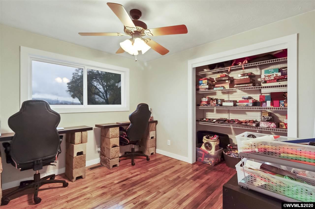 8290 Rickreall Road Rickreall, OR 97371 - Photo 14 of 40 a view of a workspace with furniture and a window