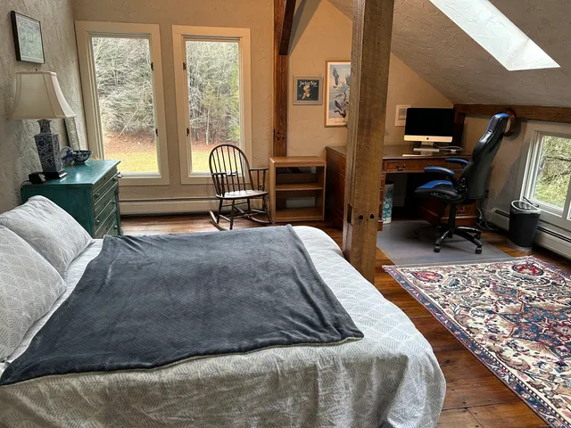 a kitchen with white cabinets sink and white appliances