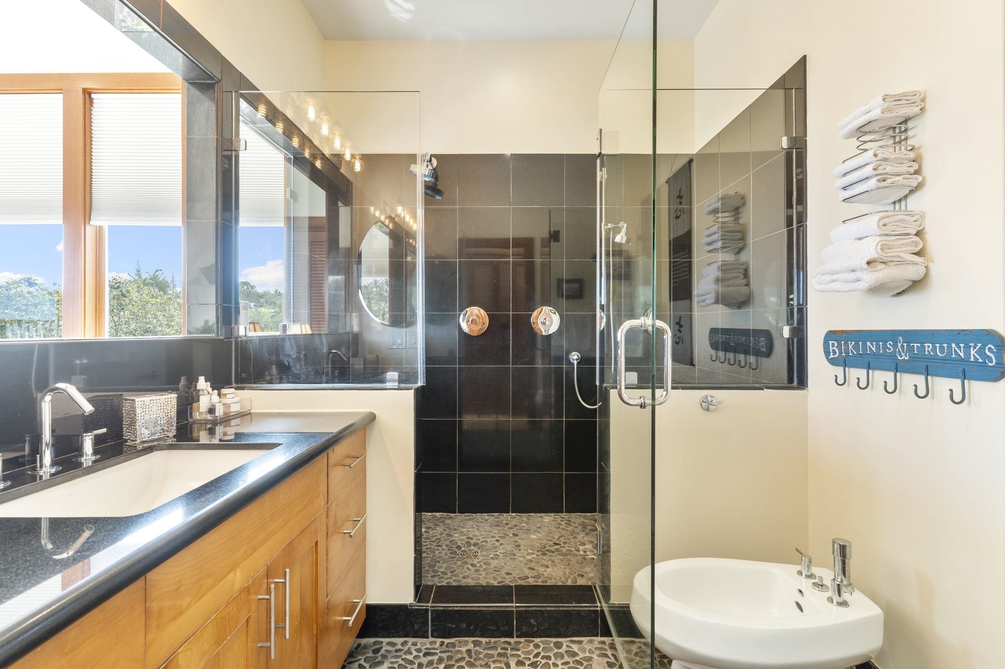 71 Door Of Faith Road Haiku, HI 96708 - Photo 13 of 30 a bathroom with a sink and a shower