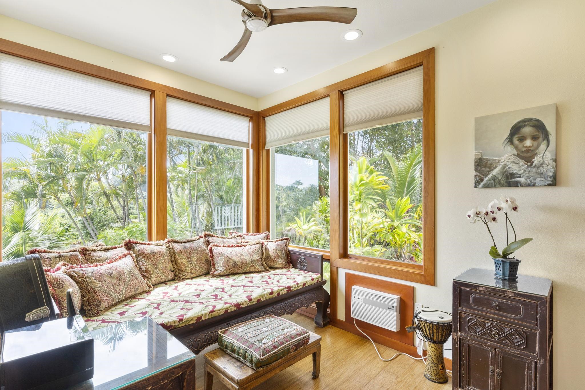 71 Door Of Faith Road Haiku, HI 96708 - Photo 14 of 30 a living room with furniture and a window