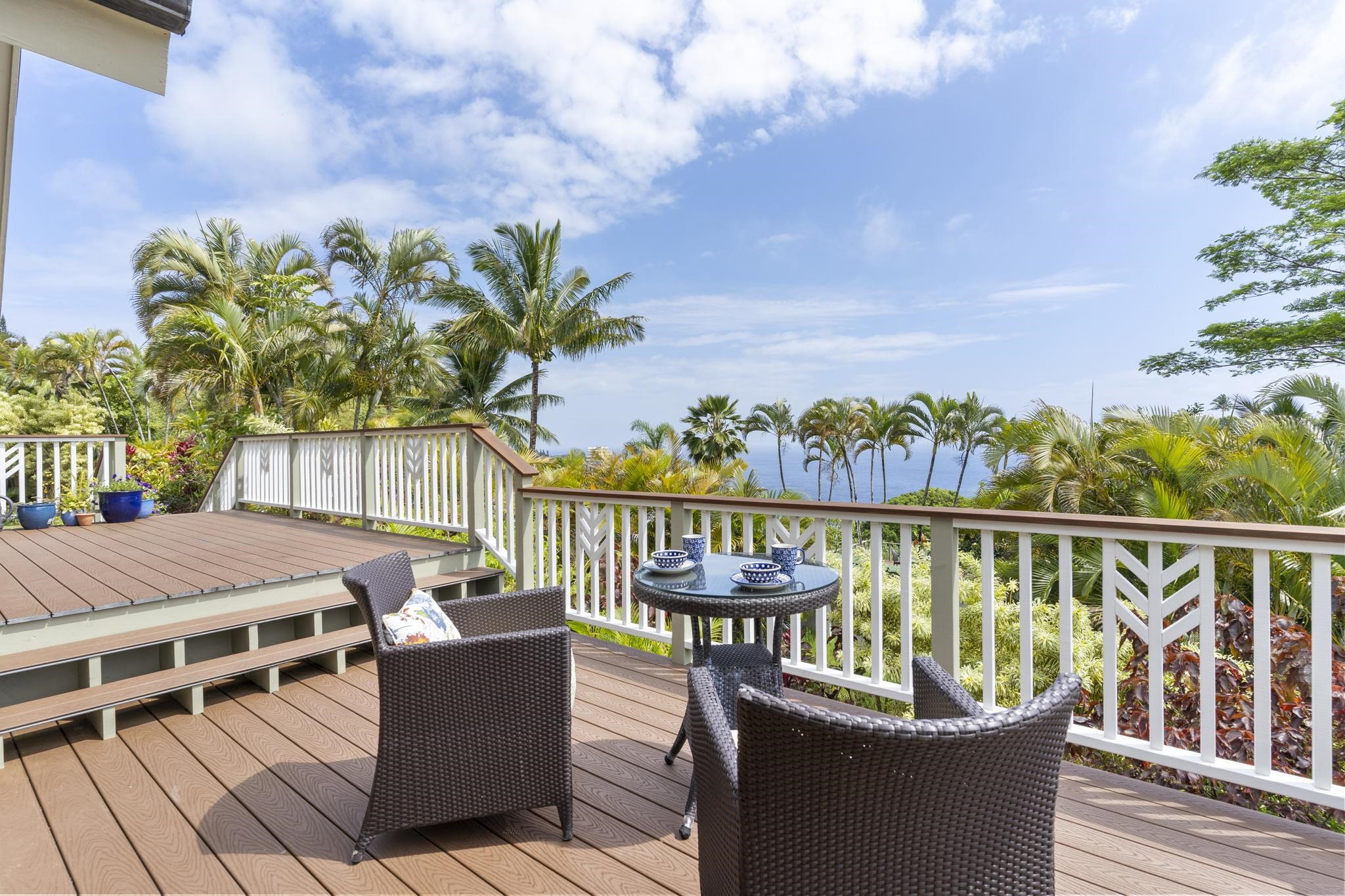 71 Door Of Faith Road Haiku, HI 96708 - Photo 16 of 30 a view of a balcony with outdoor seating