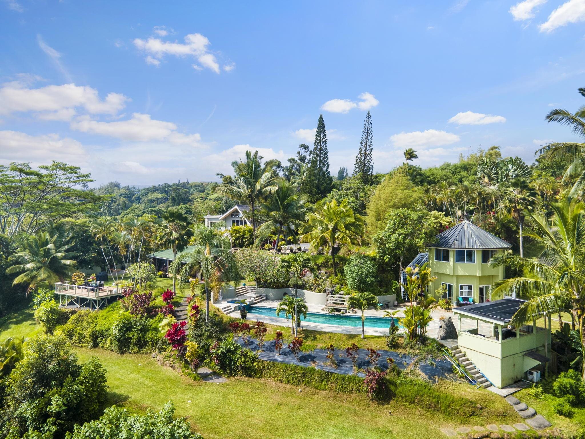 71 Door Of Faith Road Haiku, HI 96708 - Photo 2 of 30 a view of a lake with a building in the background