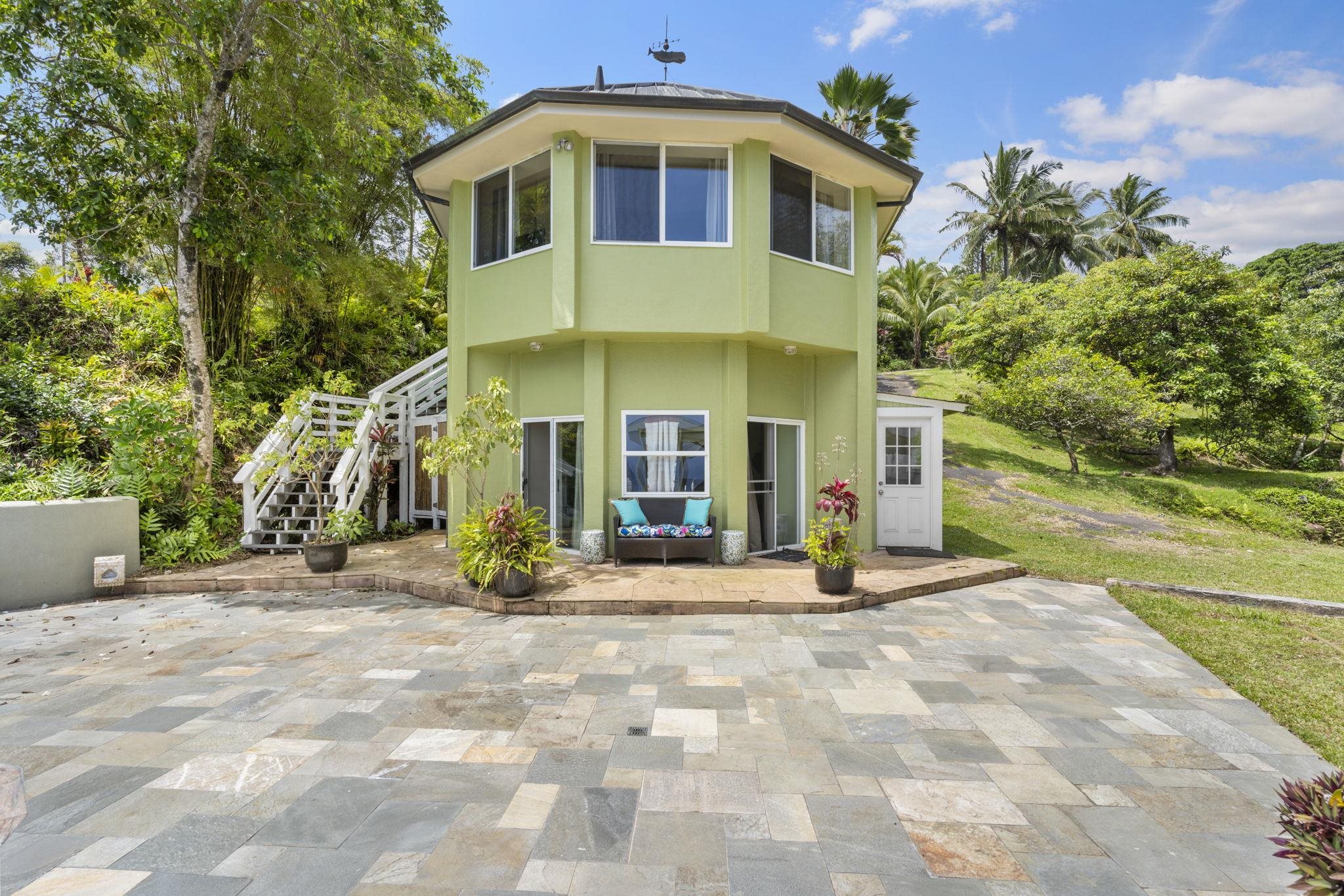 71 Door Of Faith Road Haiku, HI 96708 - Photo 23 of 30 a view of a building with many windows