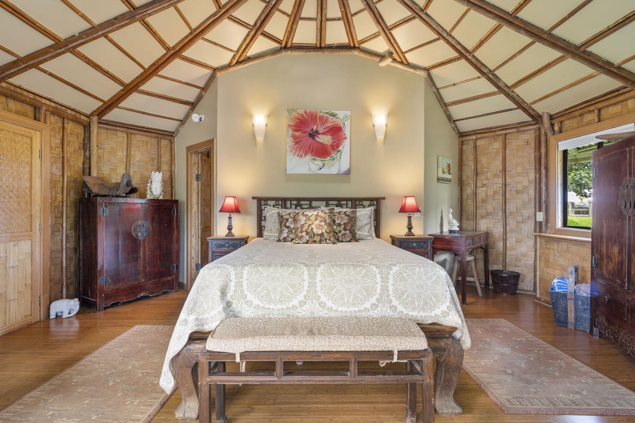 71 Door Of Faith Road Haiku, HI 96708 - Photo 27 of 30 a bed sitting in a bedroom next to a window