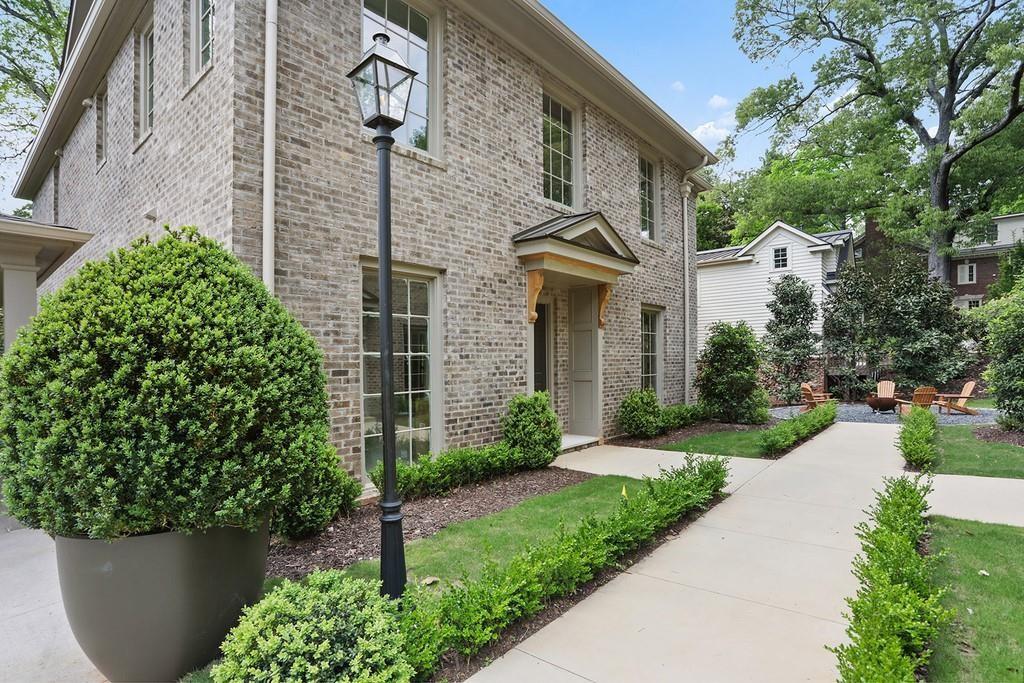 Beautiful tucked away brick cottage in the heart of Historic Druid Hills!