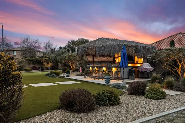 a view of a town with large trees