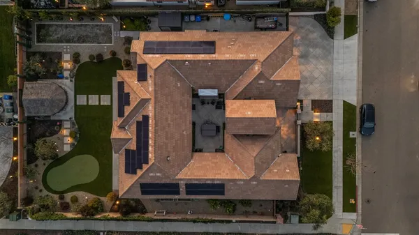 a aerial view of a house with garden