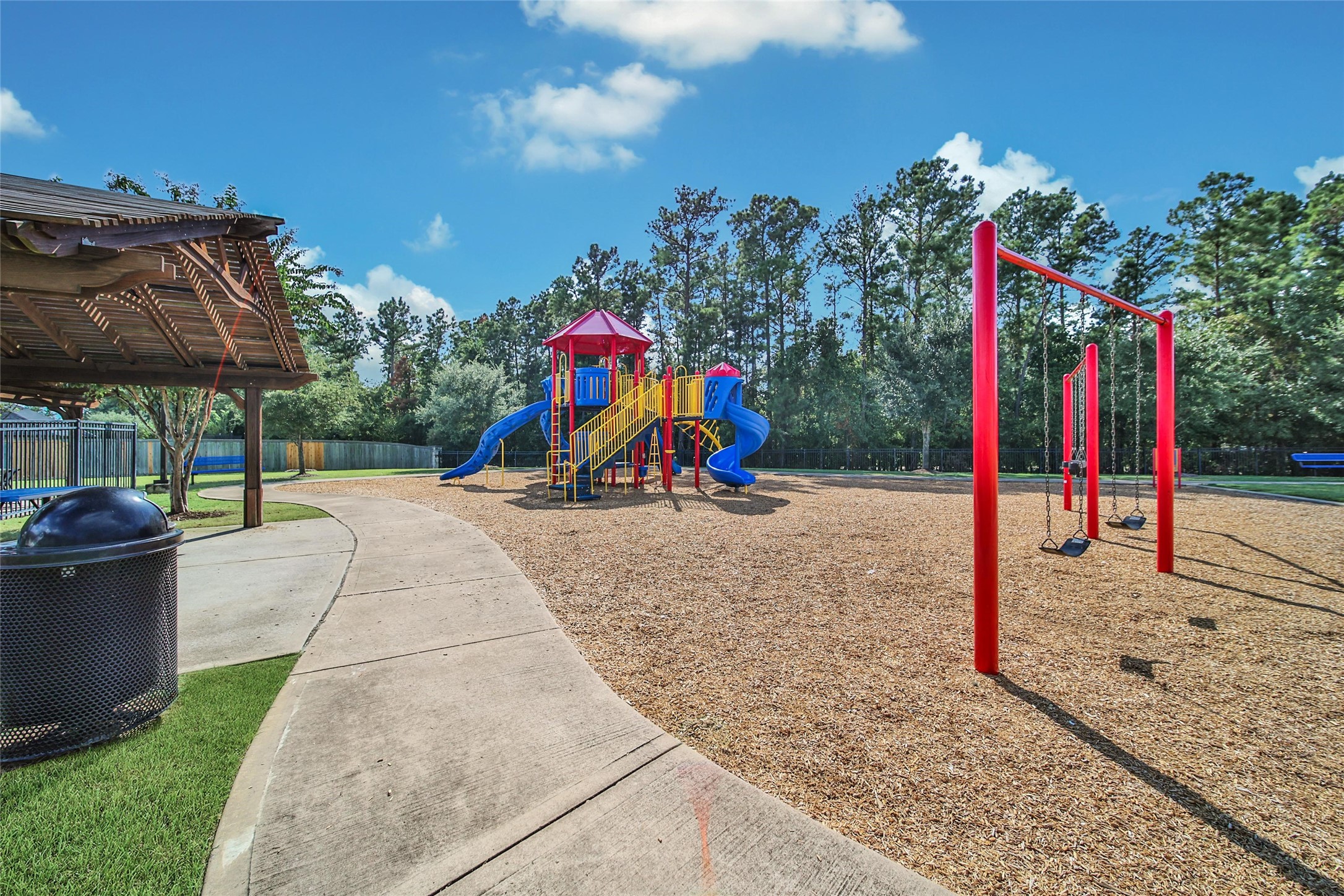 214 Pleasant Hill Way Conroe, TX 77304 - Photo 39 of 43 Visit the playground for after school for evening fun.