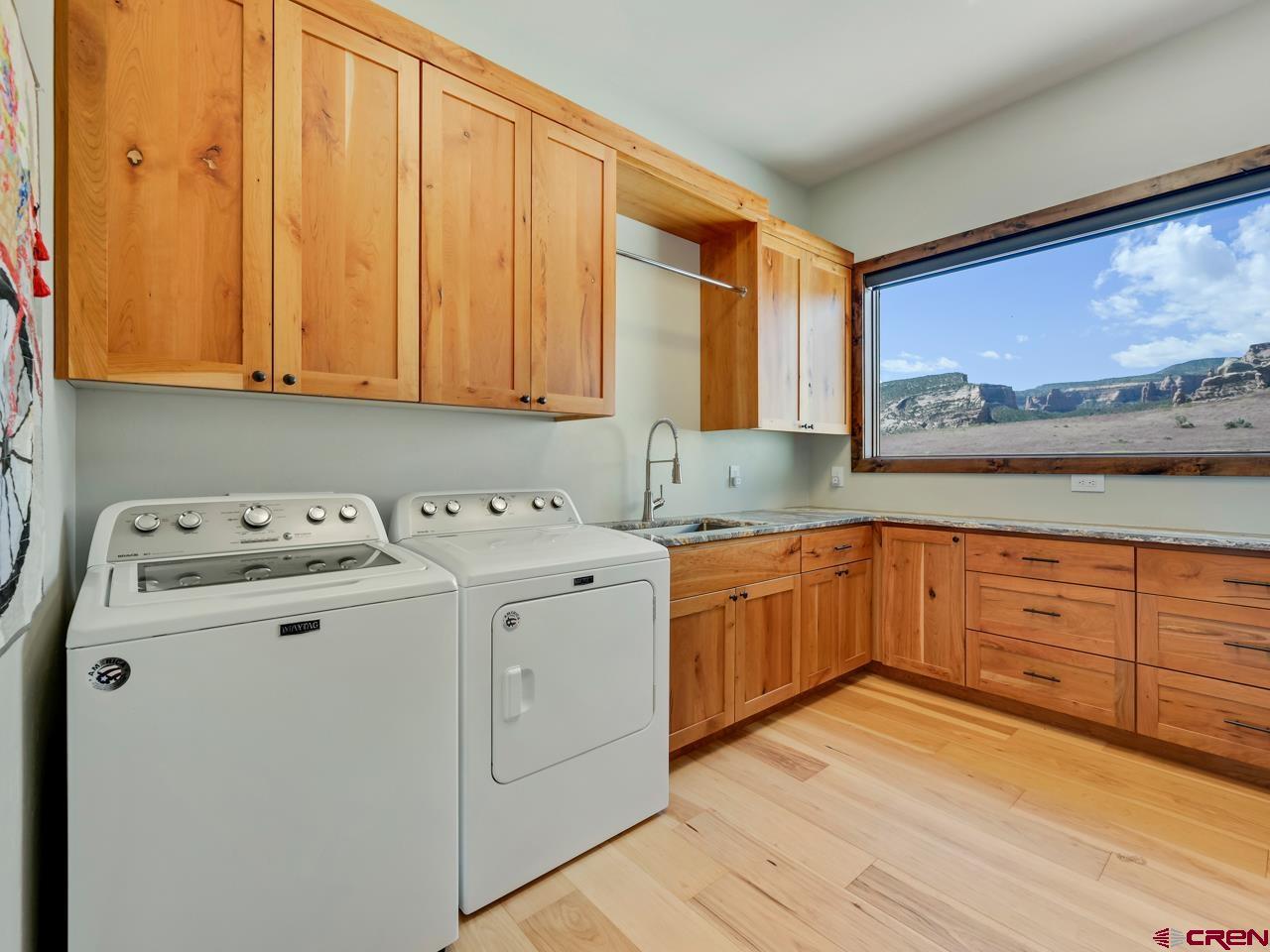 808 18 Road Grand Junction, CO 81507 - Photo 13 of 35 a view of a kitchen with stove and cabinets