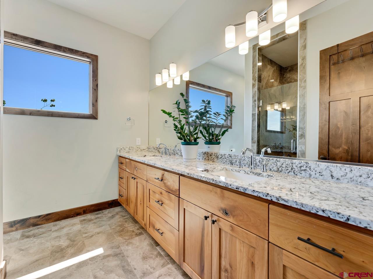 808 18 Road Grand Junction, CO 81507 - Photo 20 of 35 a bathroom with sink and mirror