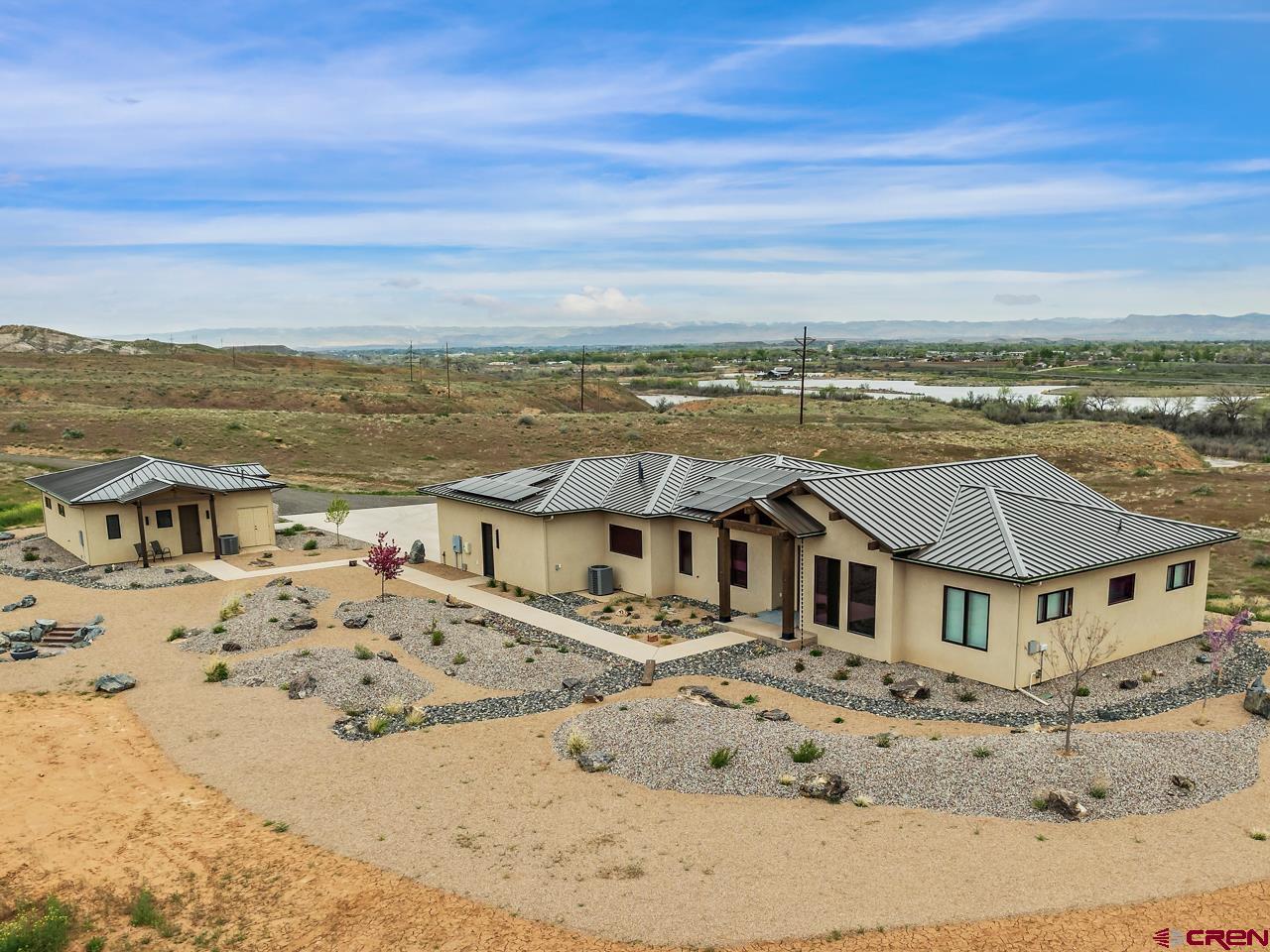 808 18 Road Grand Junction, CO 81507 - Photo 2 of 35 an aerial view of residential houses with outdoor space