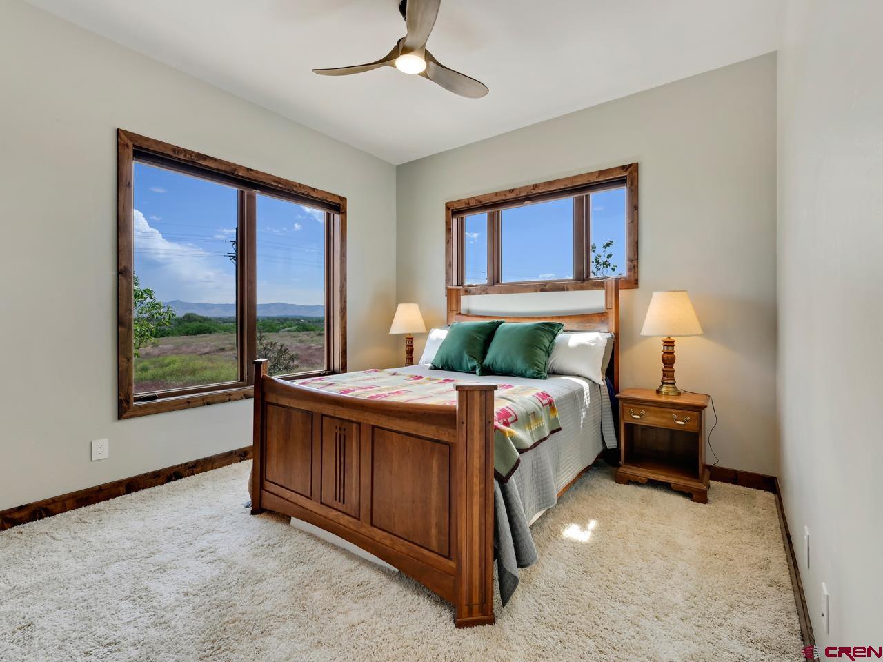808 18 Road Grand Junction, CO 81507 - Photo 21 of 35 a bedroom with a bed and window