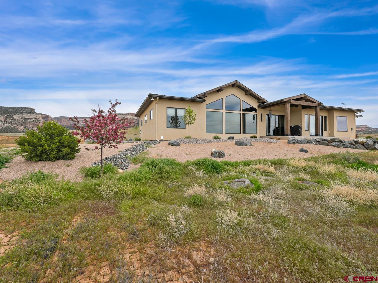 808 18 Road Grand Junction, CO 81507 - Photo 29 of 35 a front view of a house with a yard
