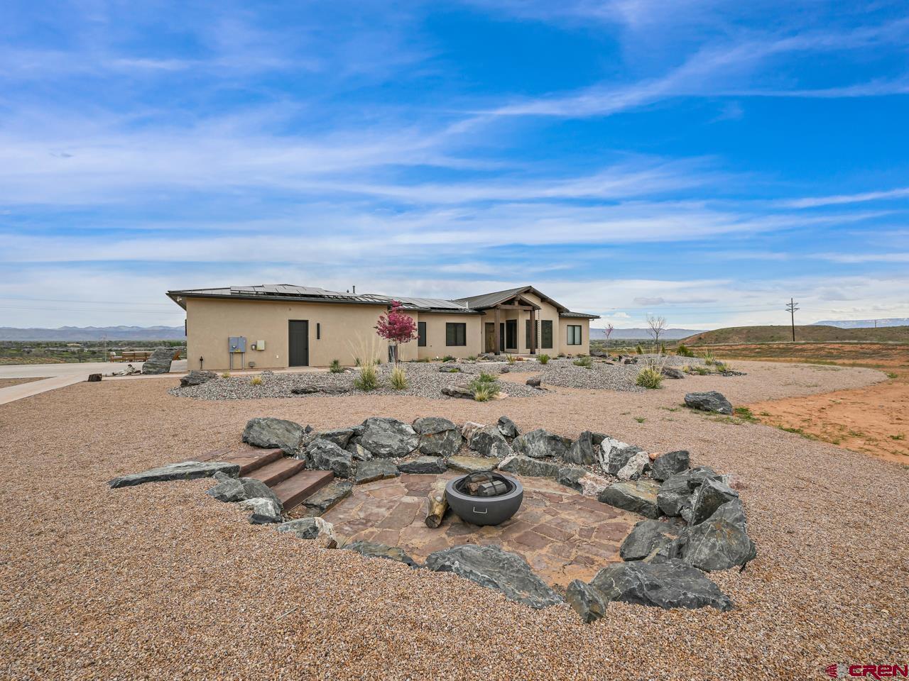 808 18 Road Grand Junction, CO 81507 - Photo 30 of 35 a view of a ocean beach with wooden floor