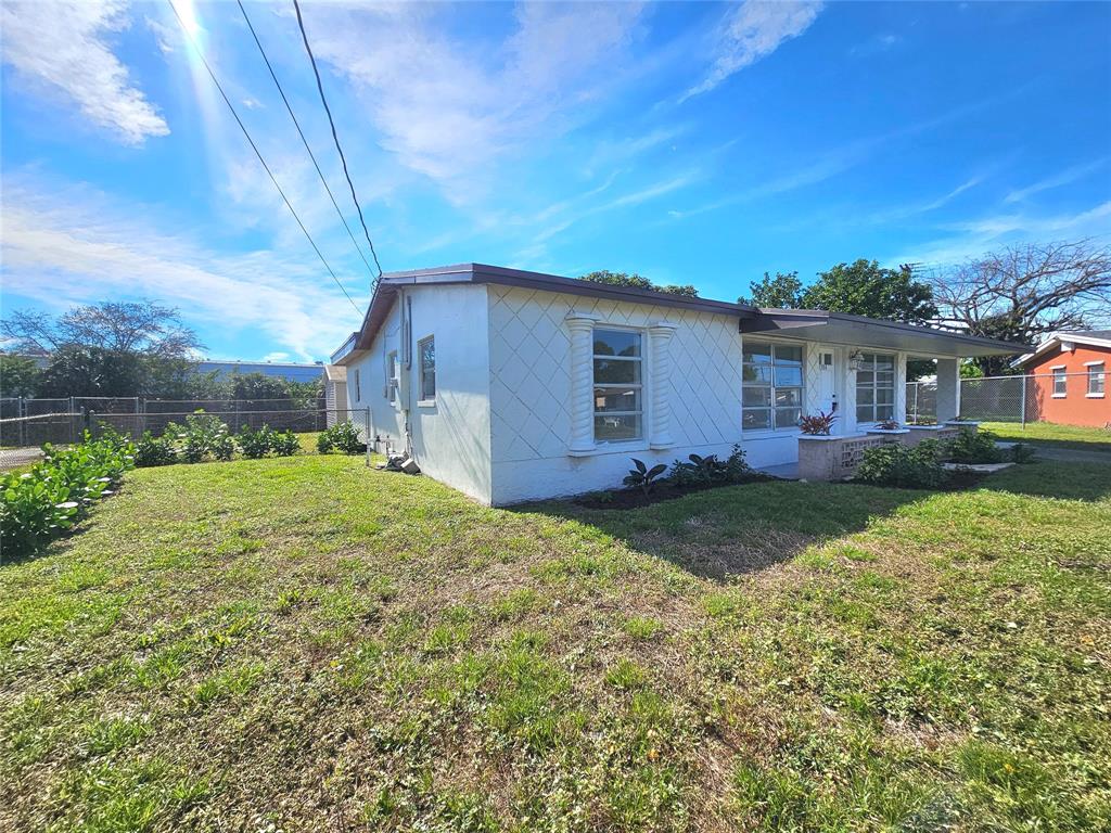 3384 Northwest 17th Street Lauderhill, FL 33311 - Photo 14 of 14 SIDE VIEW OF YOUR HOME.