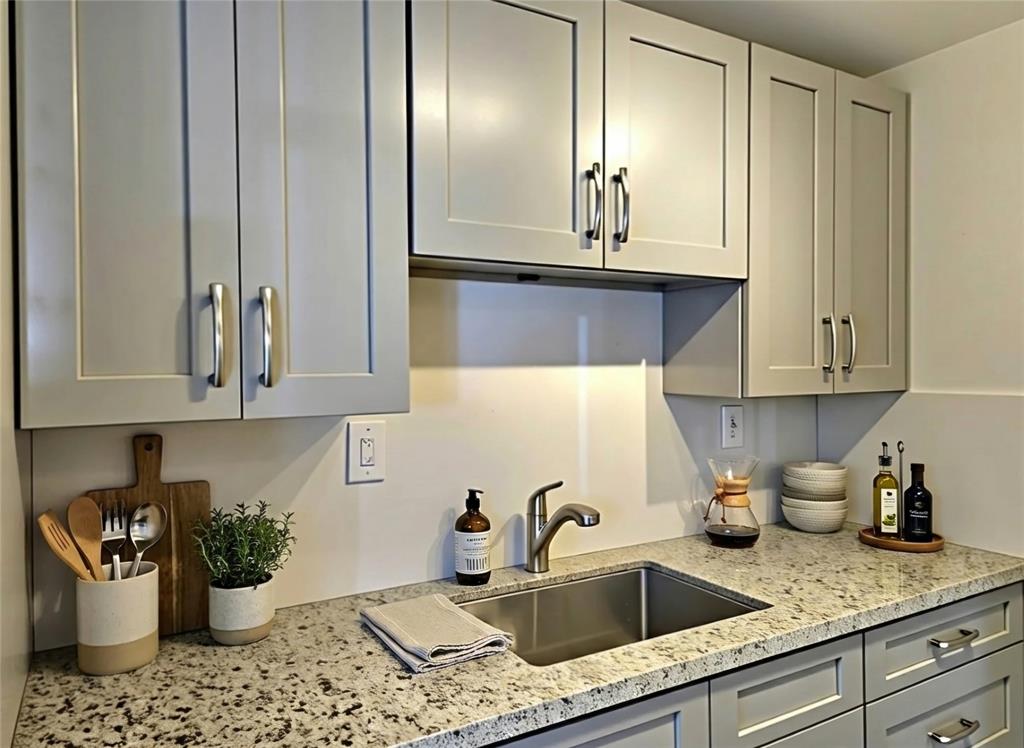 3384 Northwest 17th Street Lauderhill, FL 33311 - Photo 5 of 14 ANOTHER VIEW OF THE LEFT SIDE OF THE KITCHEN. virtually staged