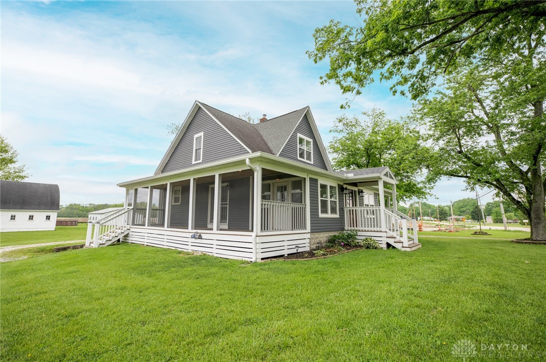 190 Swailes Road Troy, OH 45373 - Photo 65 of 82 This charming home offers a welcoming facade with lush green surroundings.